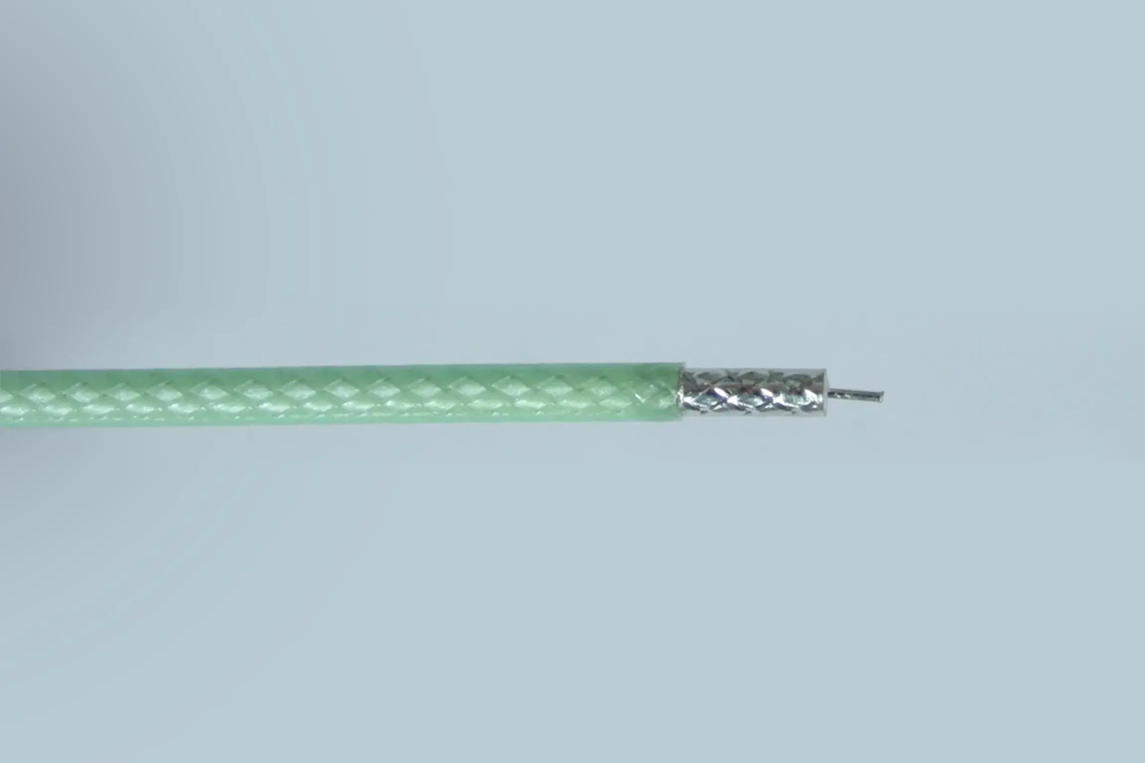 Silver wire with Green Colored wrapper.