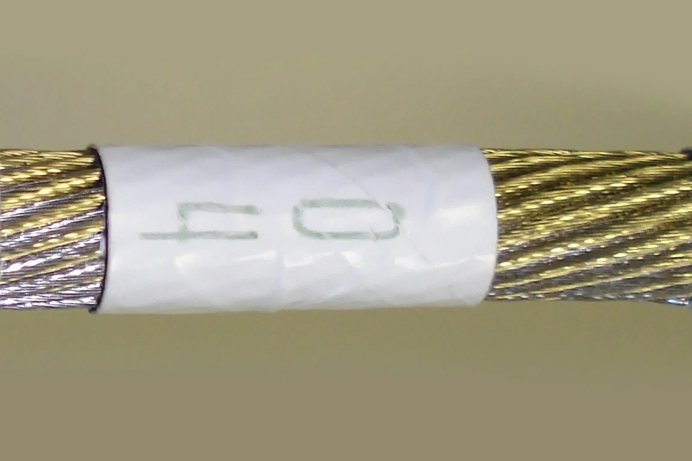 04 white colored wrapper for golden wire.